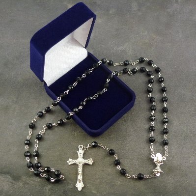 Black faceted glass Communion rosary beads in a flocked gift box