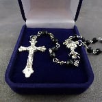 Black faceted glass Communion rosary beads in a flocked gift box