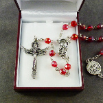 Red iridescent crystal glass trinity cross rosary beads and box