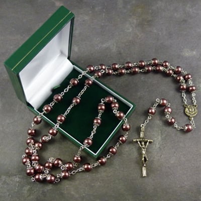 Large brown pearly rosary with filigree covered paters boxed
