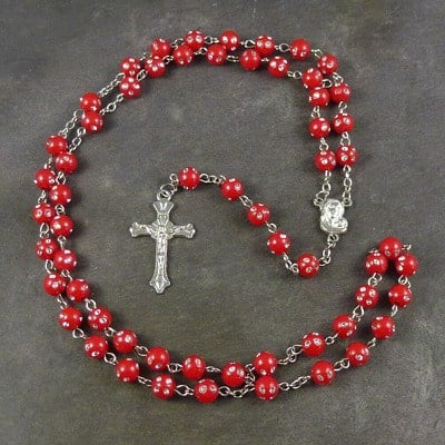 Red plastic round rosary beads with silver spotted detail 53cm length