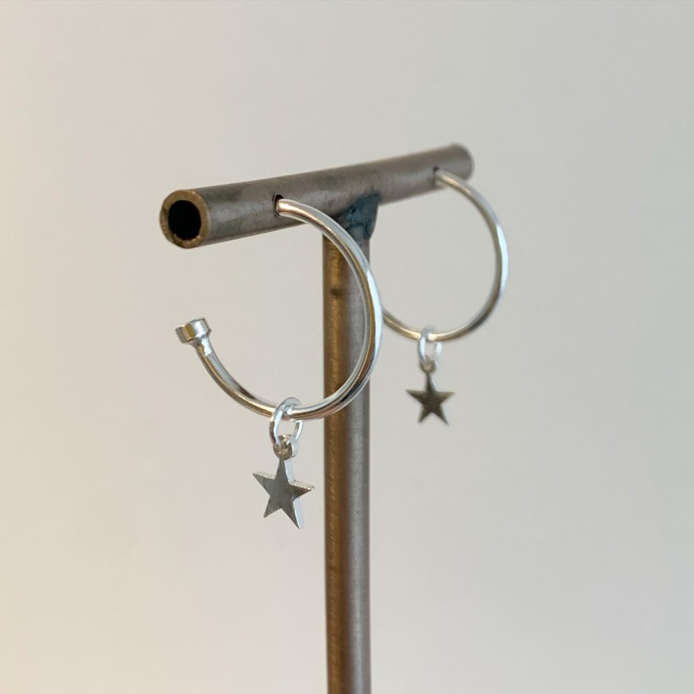 Silver hoop earrings with silver star