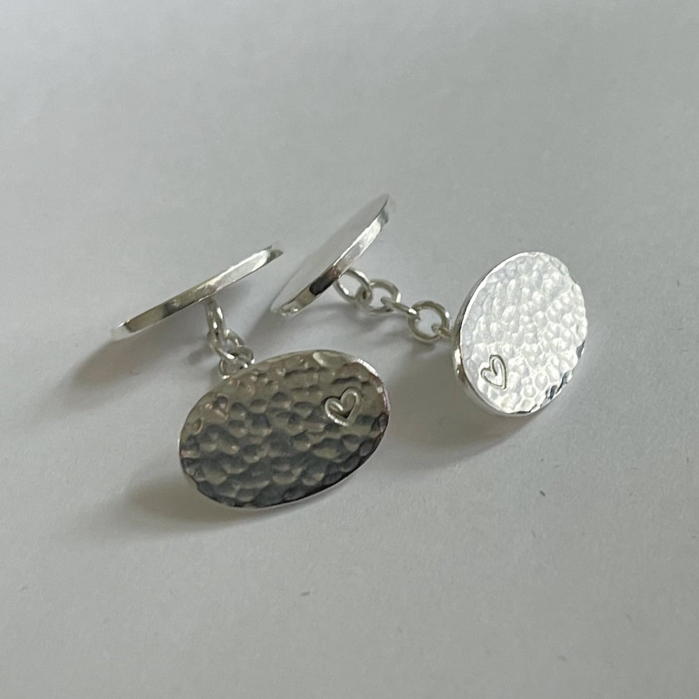 Oval hammered and polished cufflinks in sterling silver