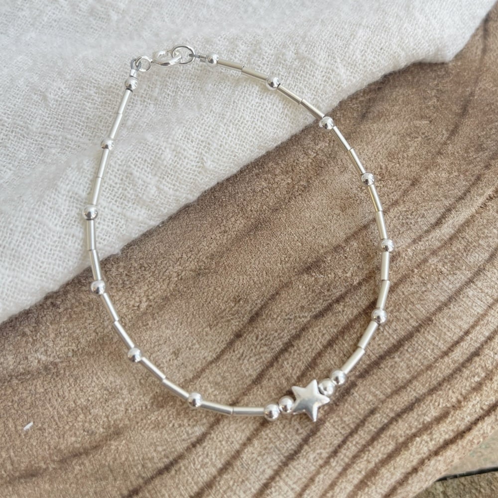 Beaded sterling silver bracelet with star bead 