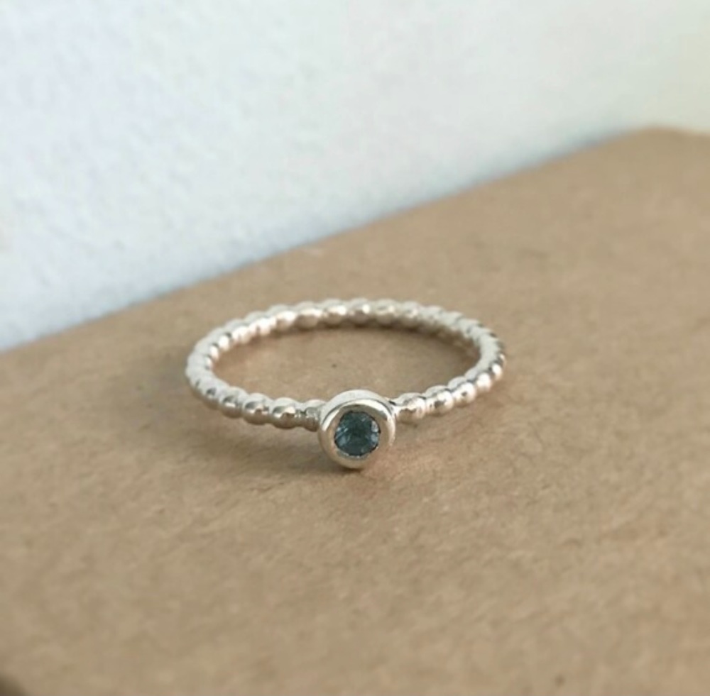 Beaded sterling silver stacking ring with London Blue Topaz