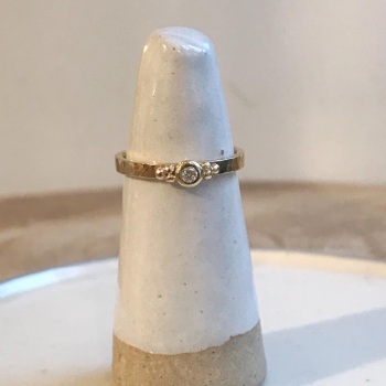 Diamond 9ct yellow gold hammered ring with bead detail