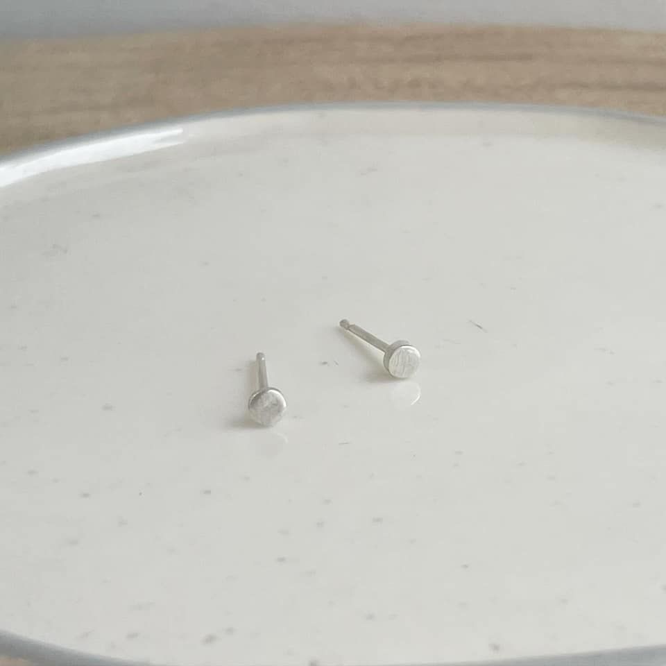Dainty little round stud earrings