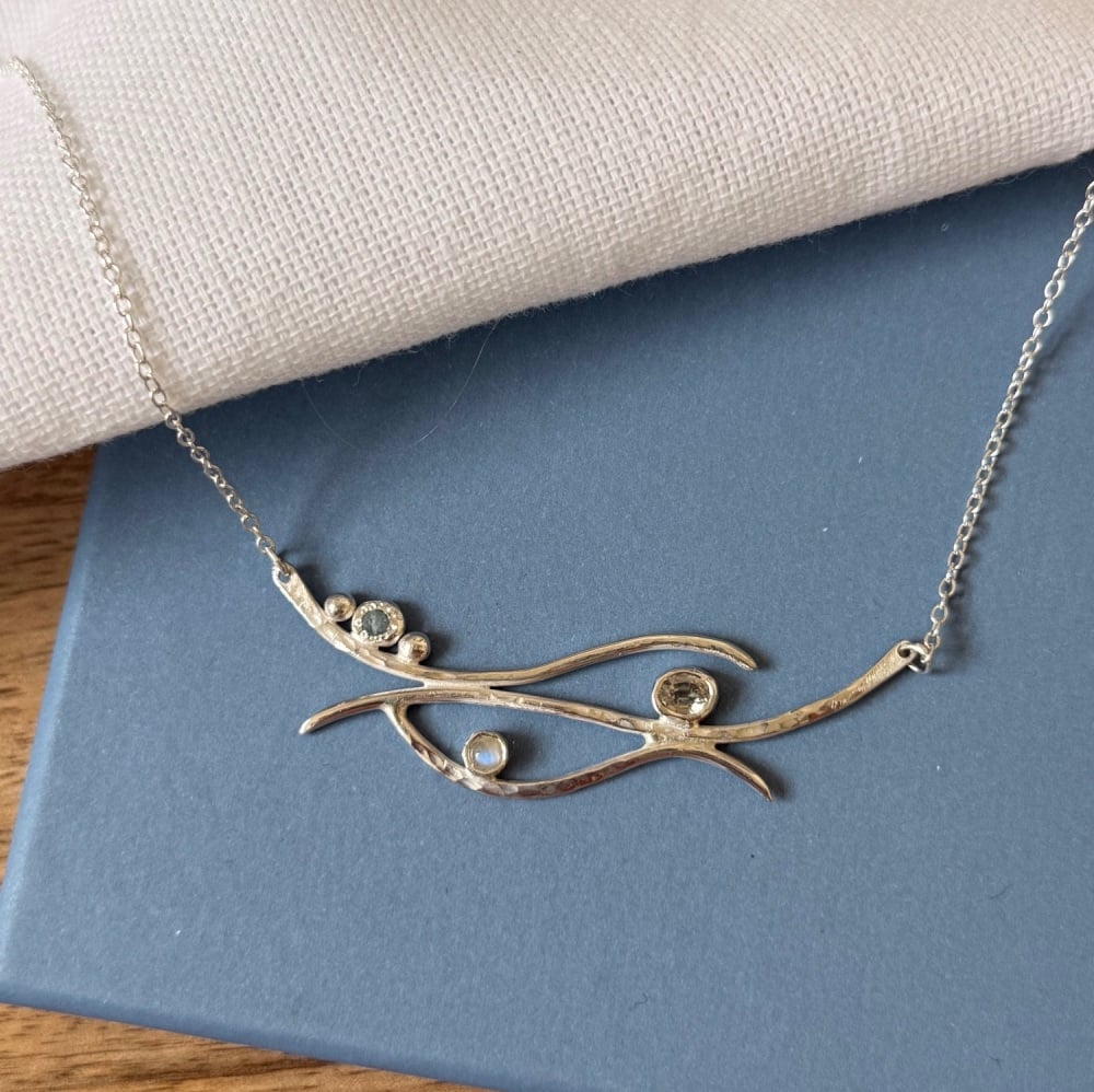 Gentle wave necklace with Sapphire, Aquamarine and Moonstone