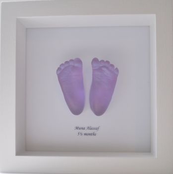Coloured glass feet framed