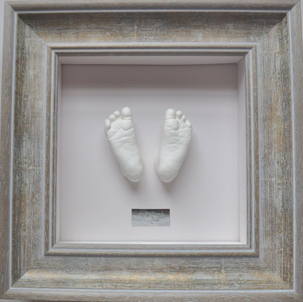 Plaster baby feet in Bevelled frame