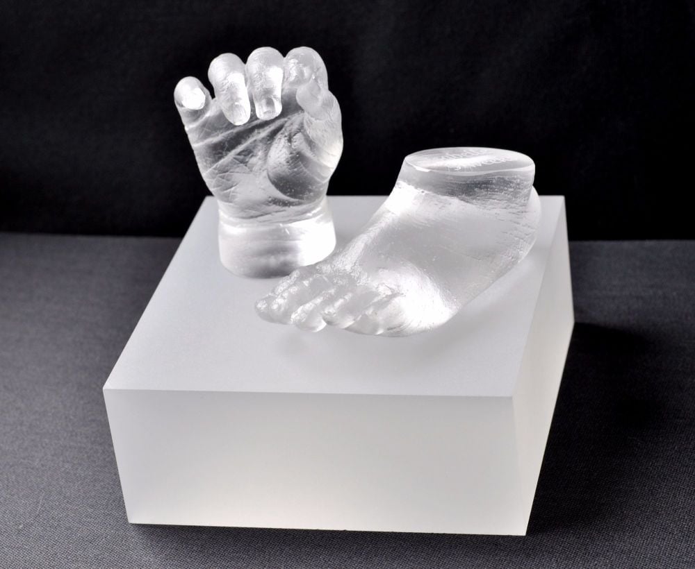 Crystal glass hand and foot on base
