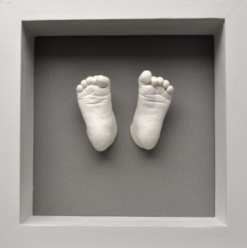 Plaster baby feet framed