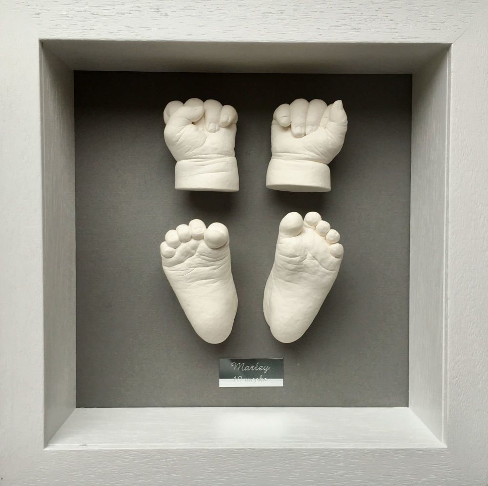 Baby hands and feet framed