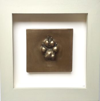Bronze resin dog paw print framed