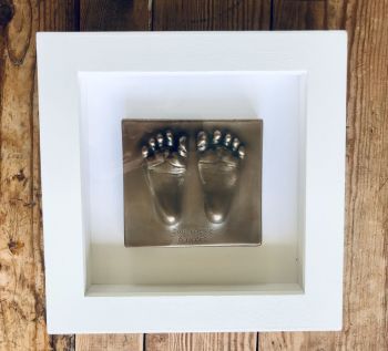 Framed extra small bronze resin baby feet impression