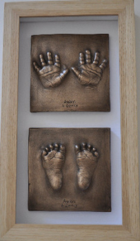 2 small Bronze Resin impressions framed