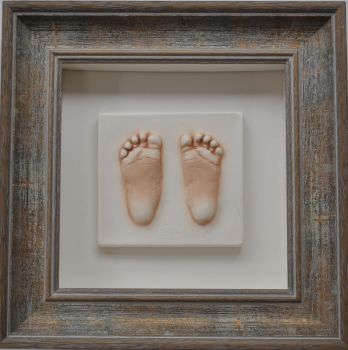 Extra small impression in a bevelled frame with soft white mount