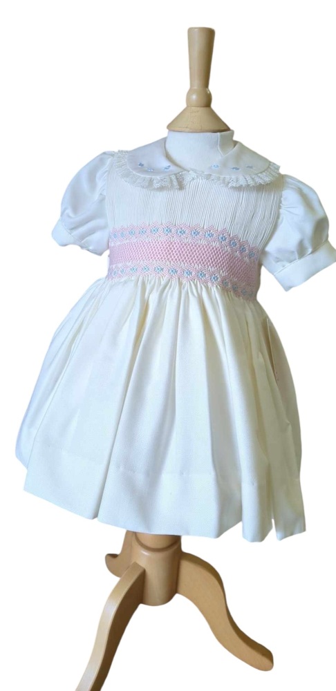 Girls Naxos Hand Smocked Dress 7425 Cream with Pink and Blue Smocking