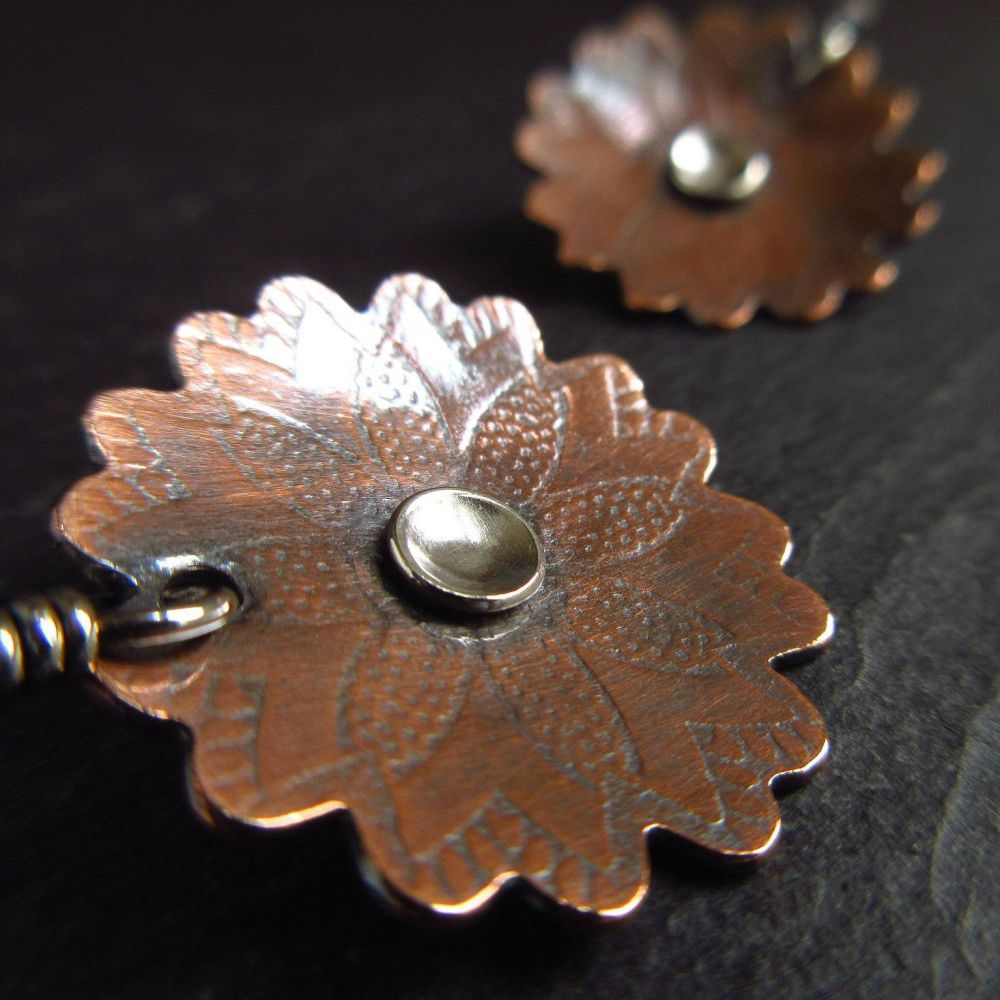 Embossed Copper Flower Earrings With Silver Disc
