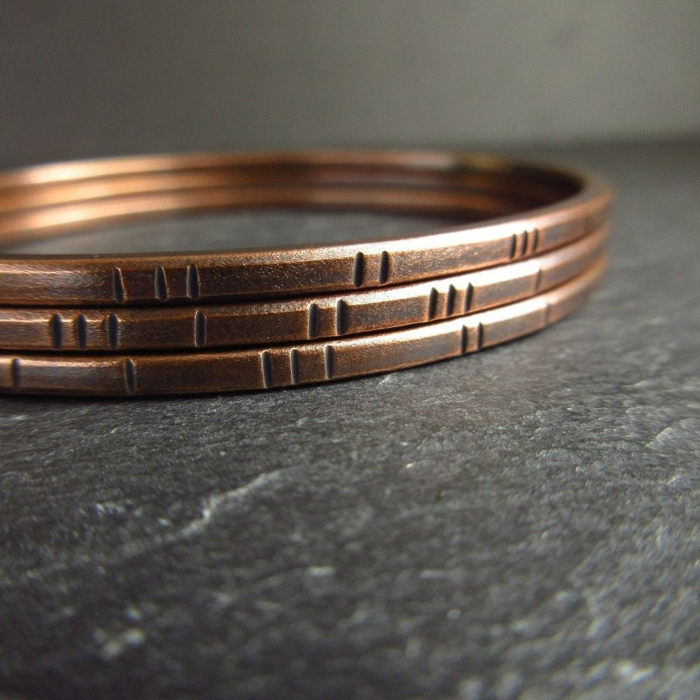 Oval Bronze Bangles with Line Decoration and Square Wire