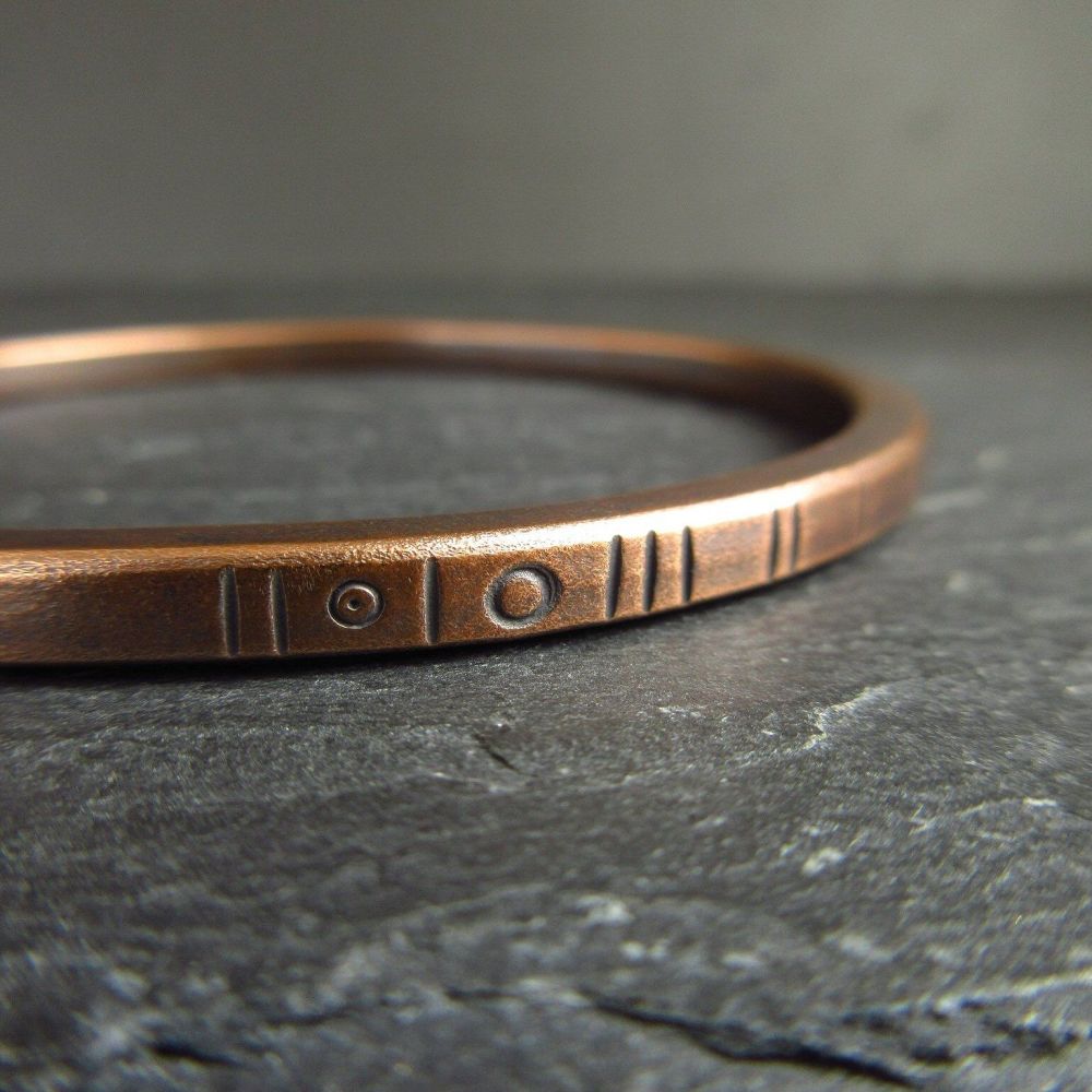 Oval Bronze Bangle with Line and Circle Decoration - Square Wire