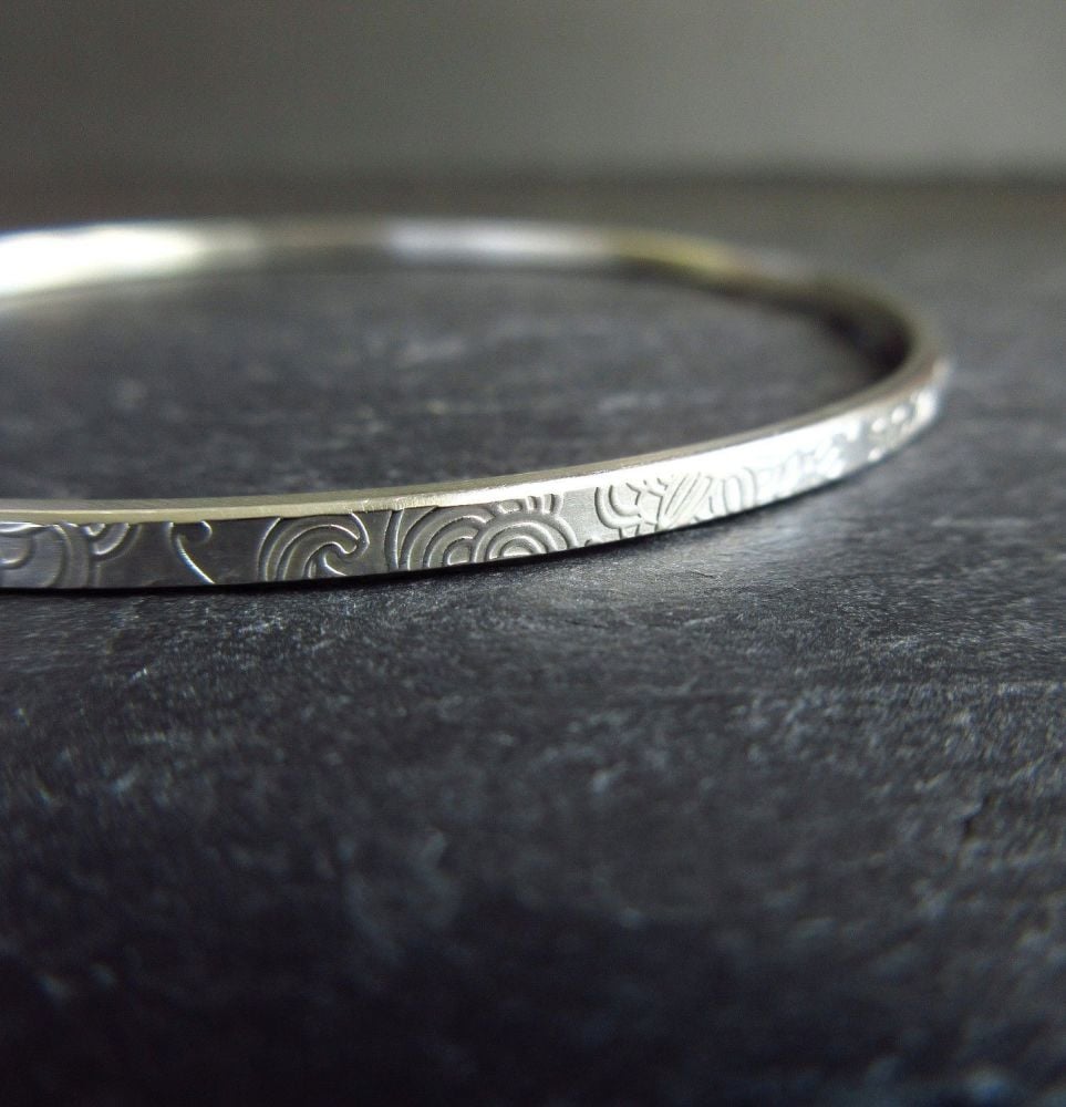 Slim Sterling Silver Bangle with Embossed Doodle Pattern