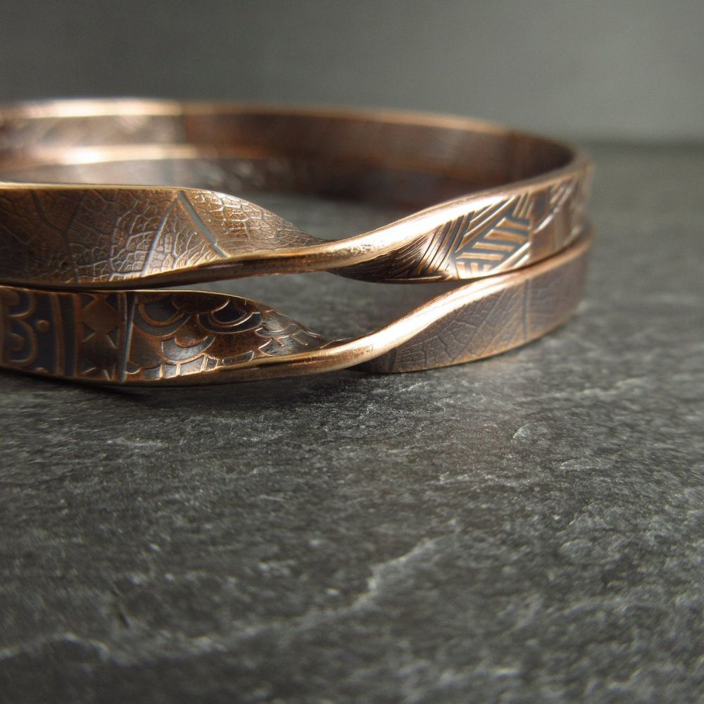 Two Bronze Bangles with Twist Design Mobius Style