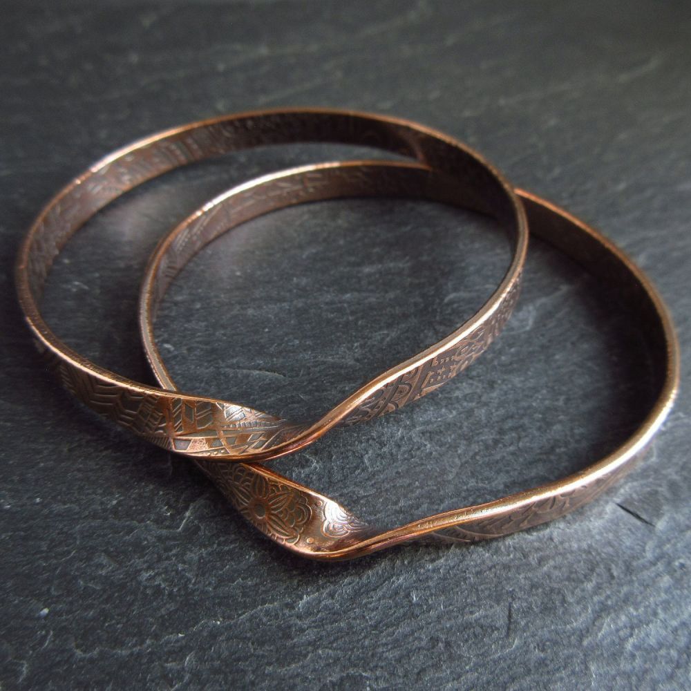 Two Copper Bangles with Twist Design Mobius Style