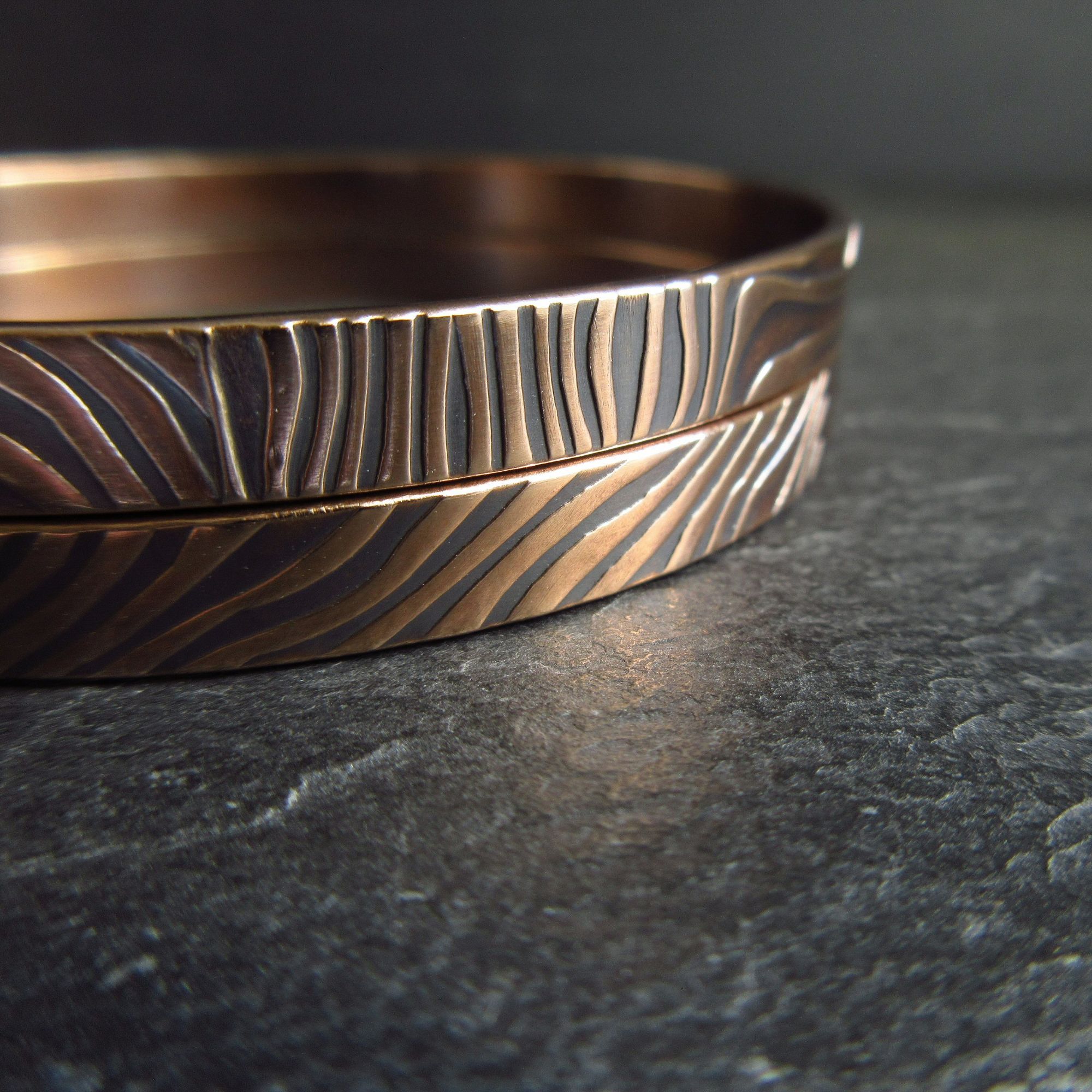 handmade bronze bangles with ripple pattern