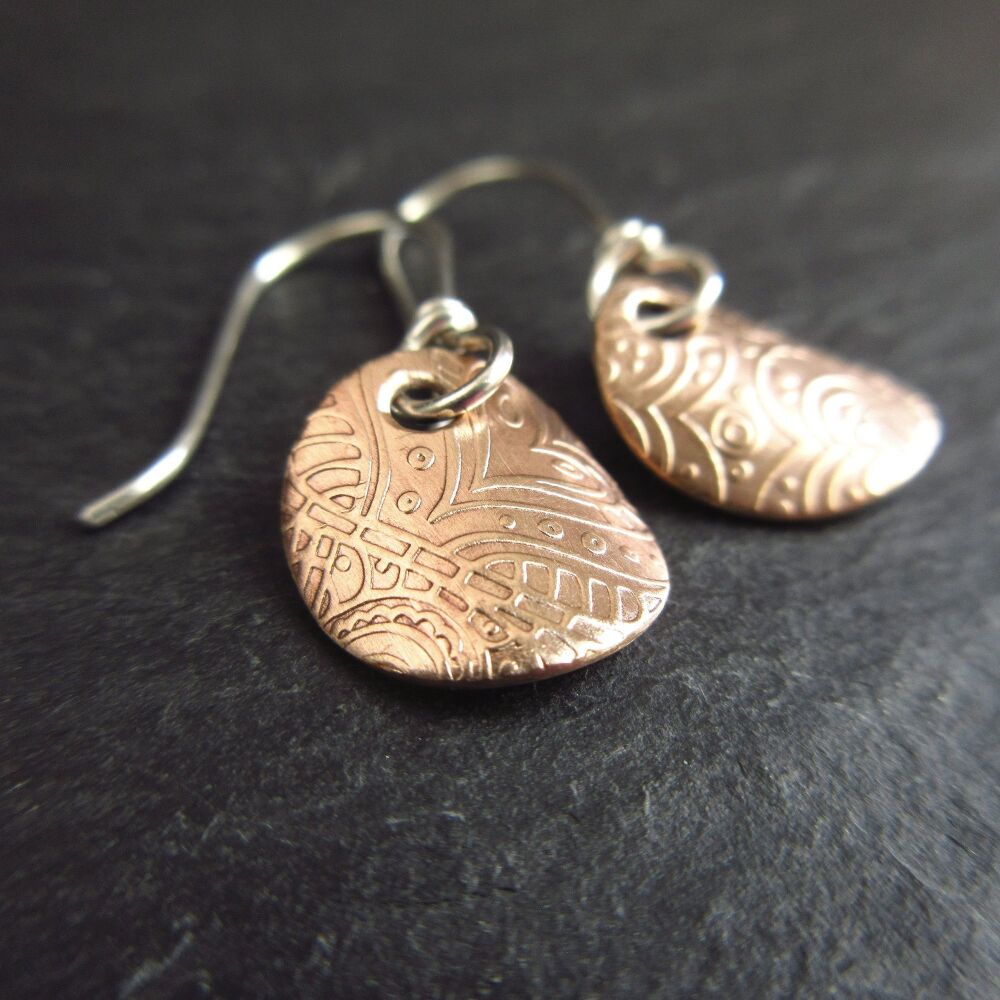 Golden Bronze Curved Disc Earrings with Heart Pattern