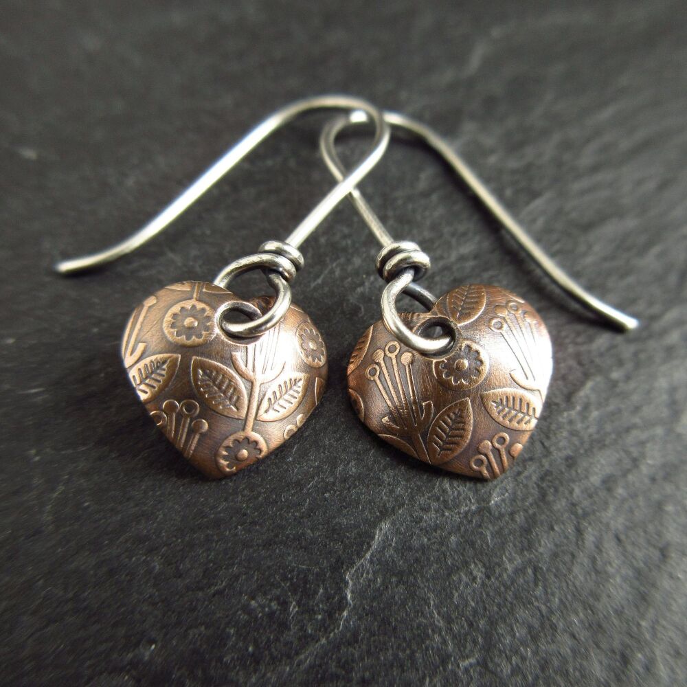 Small Bronze Heart Earrings with Flower Pattern