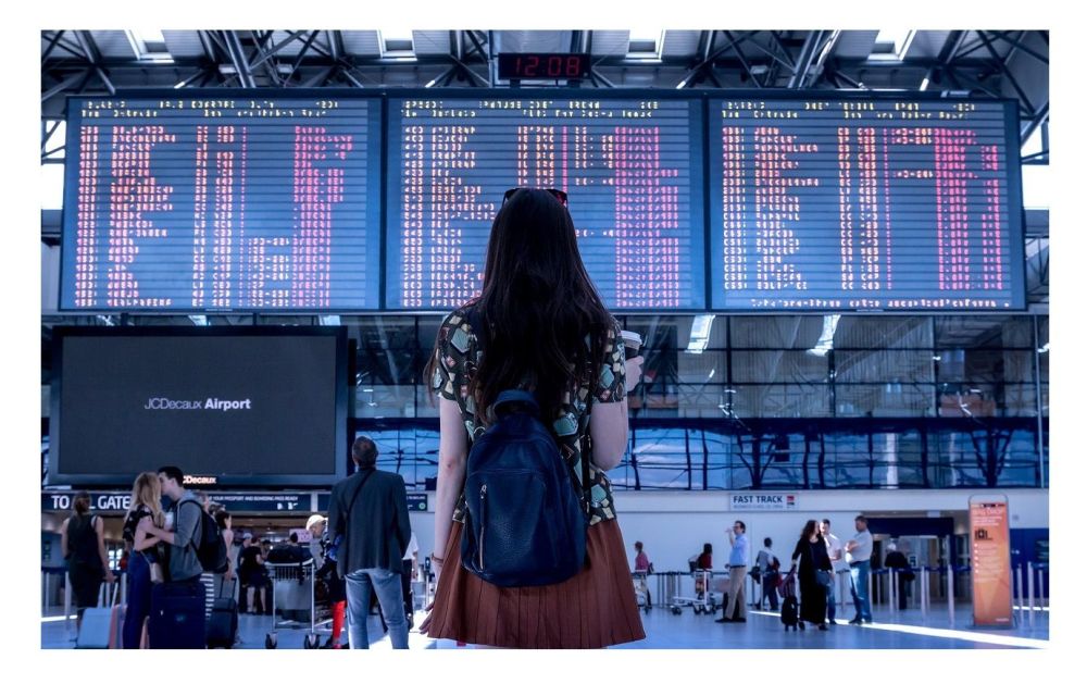 girl at airport flying rf