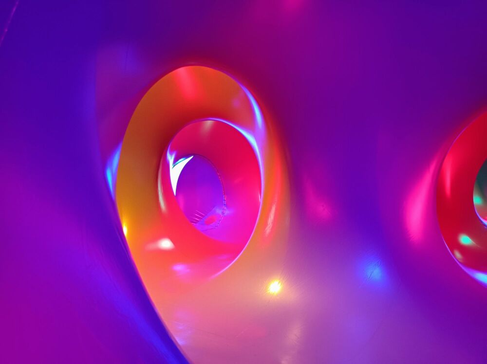 What is a Luminarium, it is lit by natural light and filled with colour.