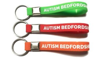 Autism Bedfordshire - Custom Printed Silicone Keyrings by Promo-Bands.co.uk
