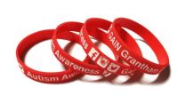 Autism GAIN - Custom Printed Deboss and Infill Silicone Wristbands by Promo