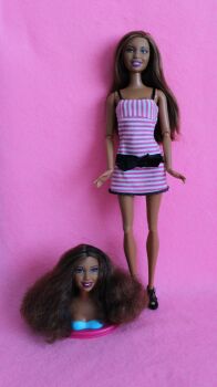 Swapping Styles Barbie doll with extra head
