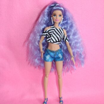 USED - Periwinkle Head Barbie on Made to Move Body