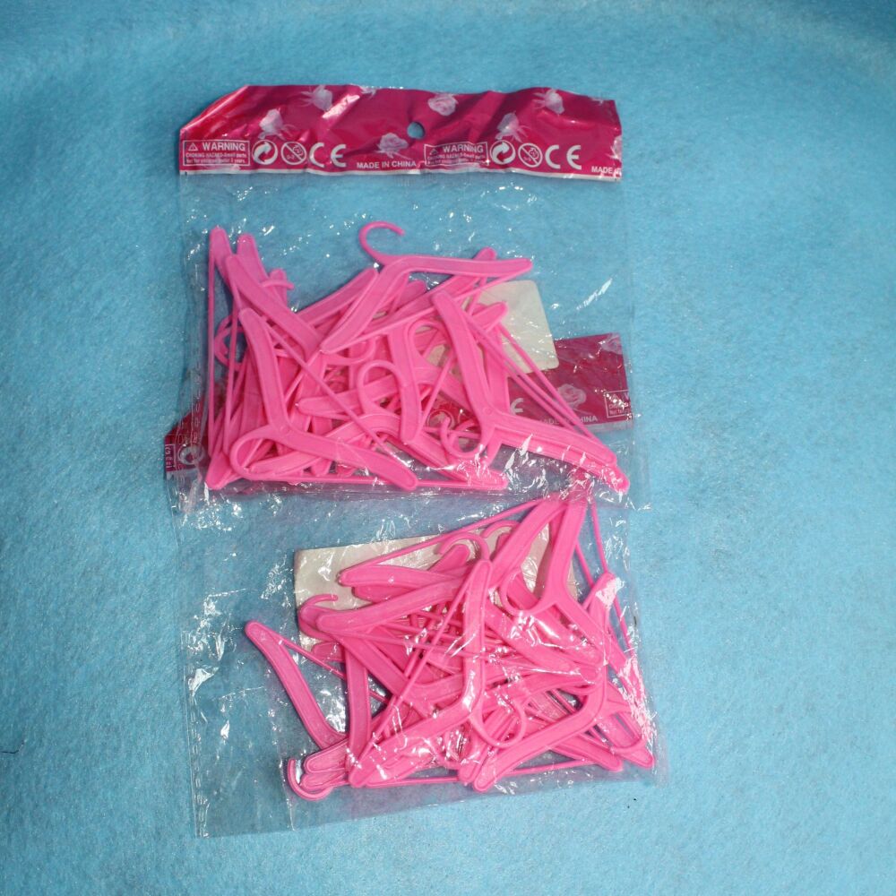 Clearance Item - S046 Assorted Pink Coat Hangers