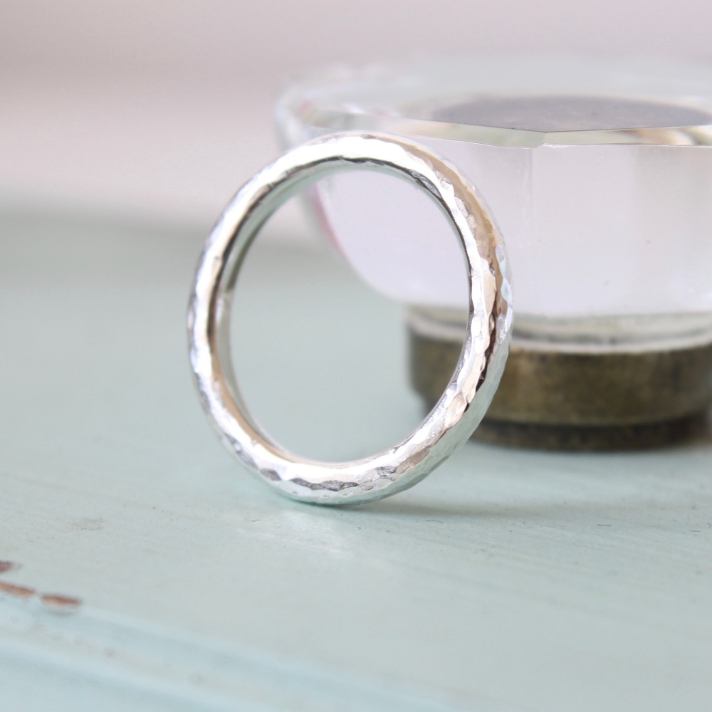 Hammered halo rings