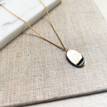 Engraved oval tag necklace