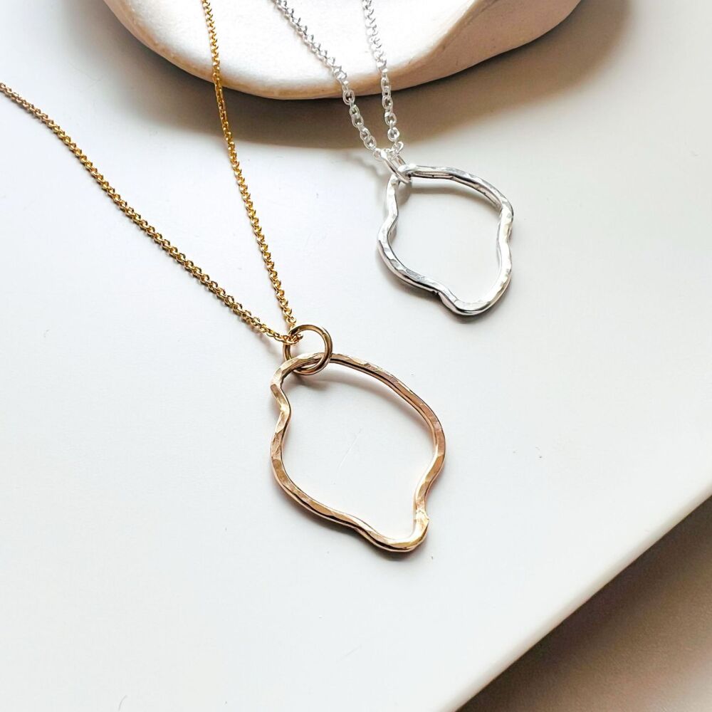 Ebb fluid shaped pendant necklace