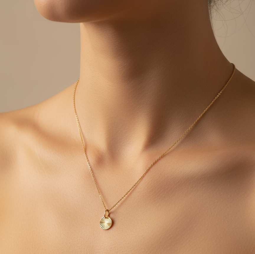 Sunburst charm necklace