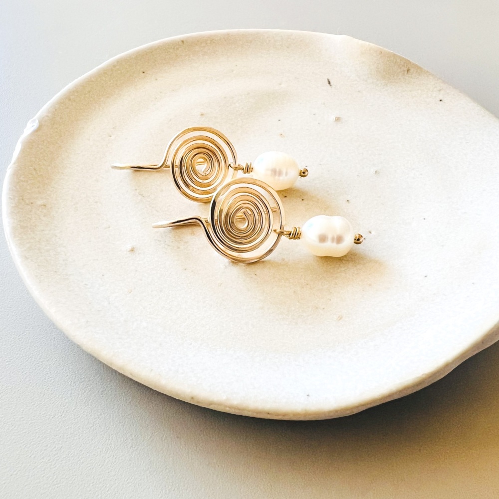Spiral and pearl drop earrings