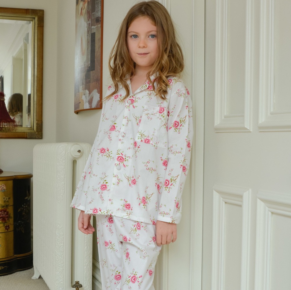 Girl's 100% cotton, traditional pyjamas in an all over rose print