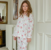 Girl's Long Sleeved Cotton Pyjamas With An All Over Pink Roses Print