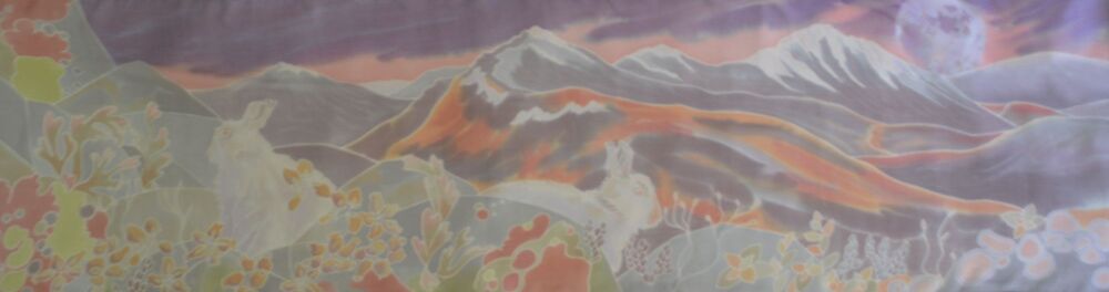 painting on chiffon scarf of mountains and hares with a full moon in grey, rust and lime