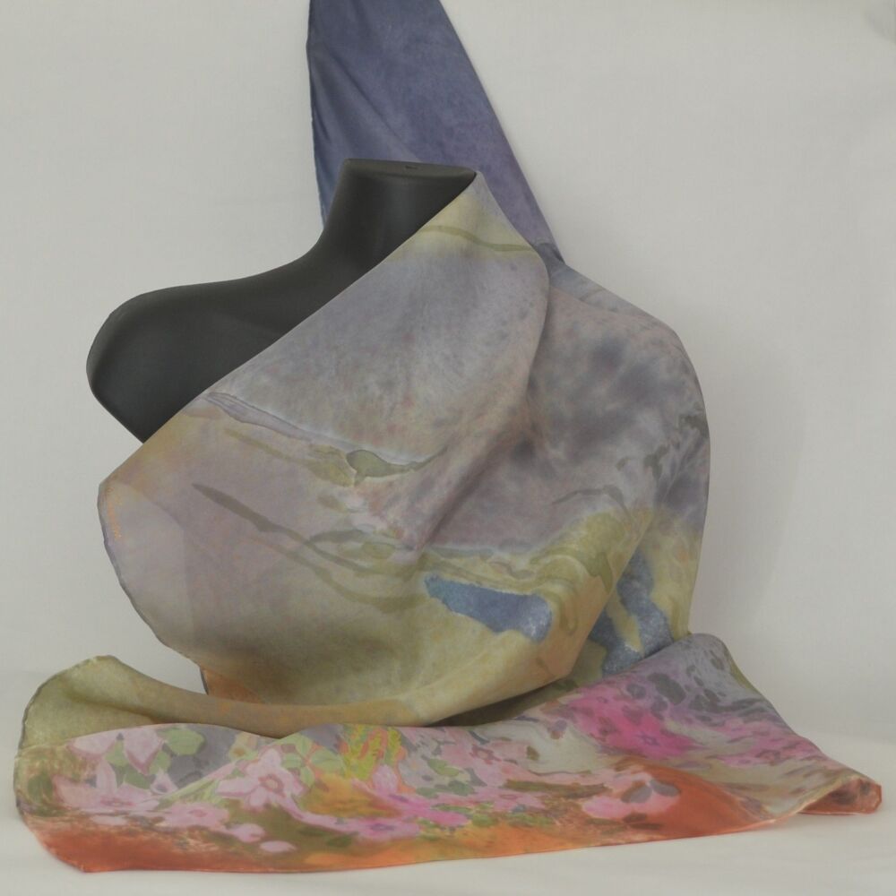 silk scarf displayed on a black mannequin
