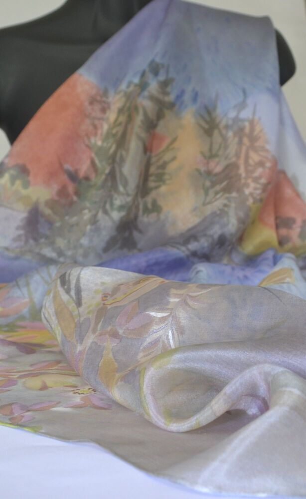 silk scarf displayed on a black mannequin