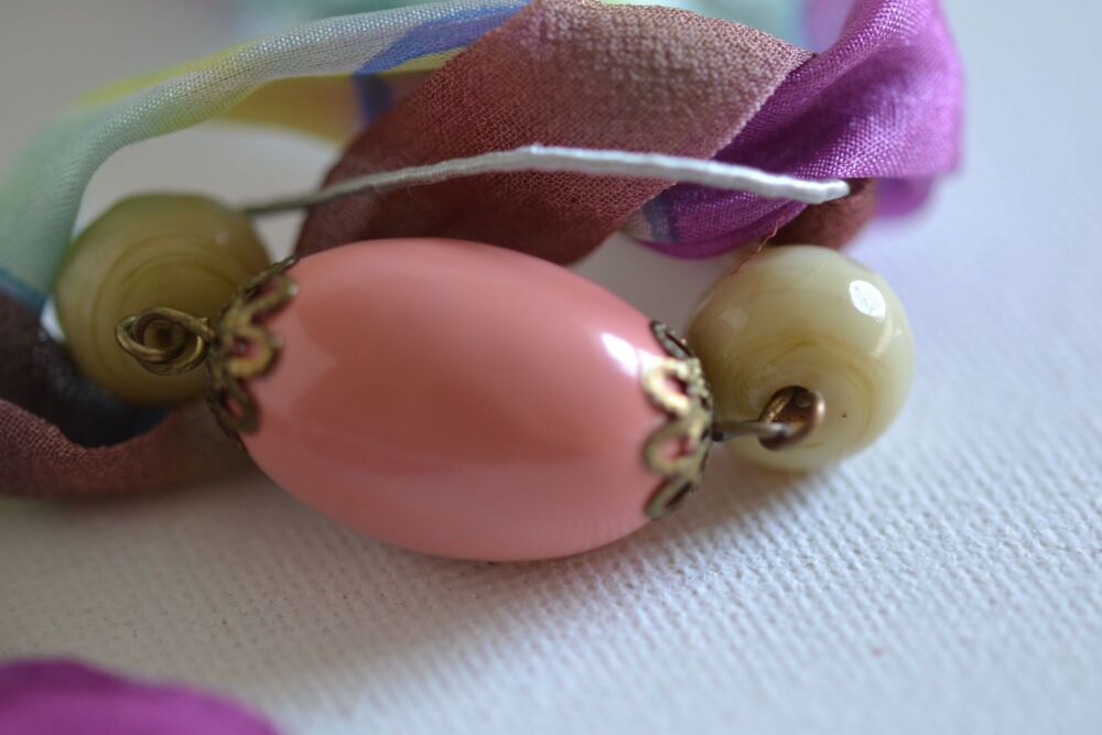 pink bead necklace detail