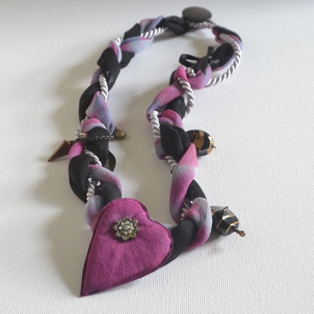 pink and black necklace with silk heart shape